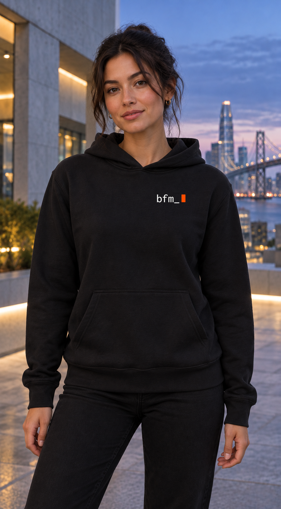BFM ORIGIN CORE v7 — Bella Canvas 7519 Black, front. AI-generated editorial image; not a photograph of the physical product.
